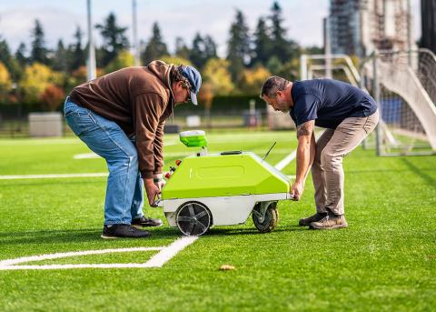 Groundskeeping team with Robby