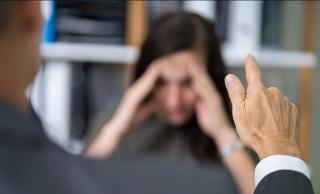 Woman holding head